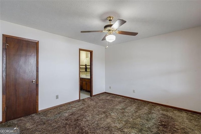 242 Herring Gull Ct, Monticello, GA 31064 - carpeted spare room featuring ceiling fan and a textured ceiling