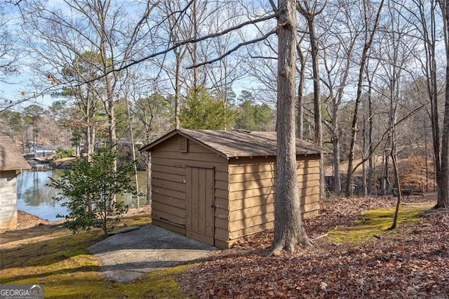 242 Herring Gull Ct, Monticello, GA 31064 - view of outbuilding featuring a water view