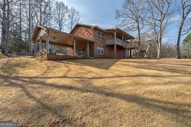 242 Herring Gull Ct, Monticello, GA 31064 - exterior space featuring a yard and a deck