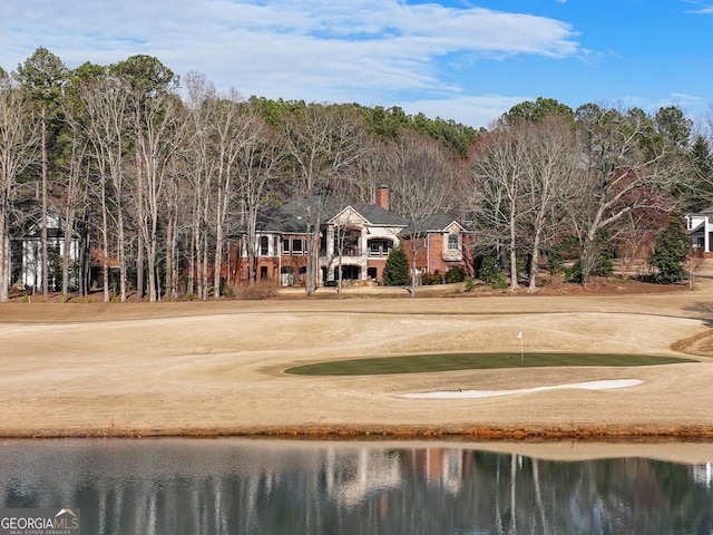 view of home's community featuring a water view