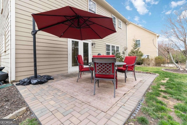 7856 Keepsake Ln, Flowery Branch, GA 30542 - view of patio with outdoor dining area