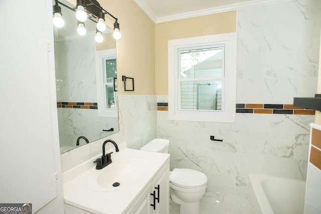 bathroom featuring tile walls, a bathtub, ornamental molding, vanity, and toilet