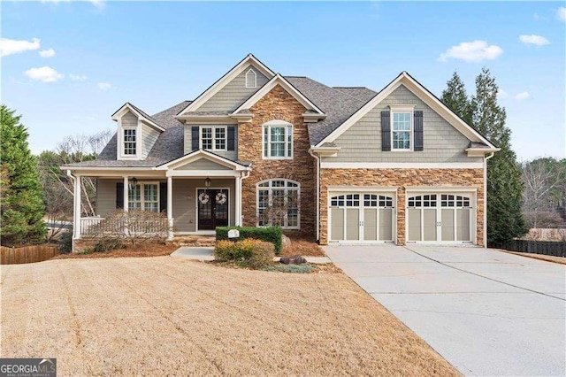 craftsman-style house featuring a garage and a porch