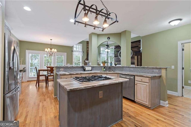 3130 Kates Way NW, Kennesaw, GA 30152 - kitchen featuring stainless steel appliances, a chandelier, a kitchen island, light wood-style floors, and recessed lighting