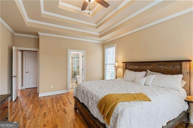 3130 Kates Way NW, Kennesaw, GA 30152 - bedroom featuring a raised ceiling, wood finished floors, crown molding, and ensuite bath