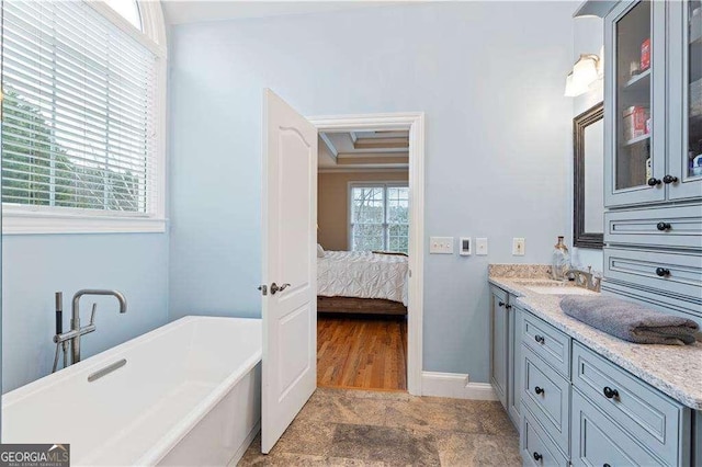 3130 Kates Way NW, Kennesaw, GA 30152 - full bath featuring vanity, a freestanding tub, ensuite bath, and baseboards
