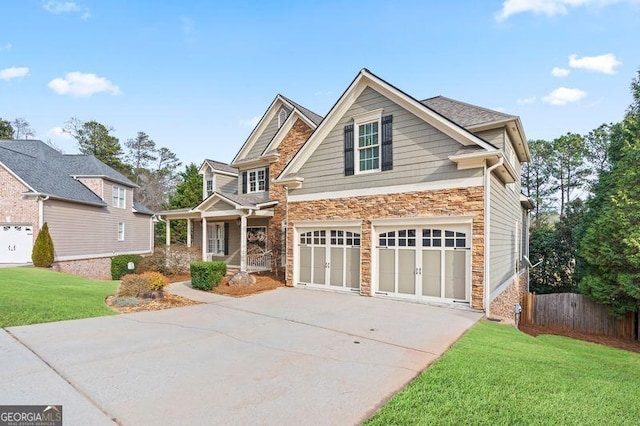 3130 Kates Way NW, Kennesaw, GA 30152 - craftsman inspired home with stone siding, concrete driveway, and an attached garage