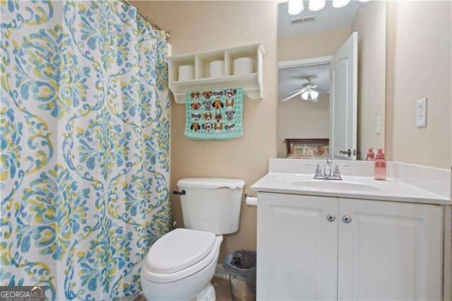 3130 Kates Way NW, Kennesaw, GA 30152 - bathroom featuring a ceiling fan, vanity, toilet, and a shower with shower curtain
