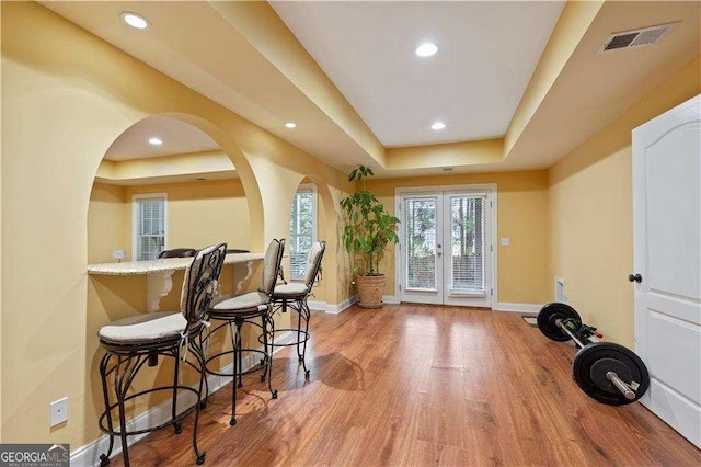 3130 Kates Way NW, Kennesaw, GA 30152 - bar featuring a raised ceiling, baseboards, wood finished floors, and recessed lighting