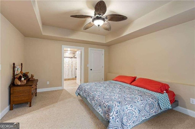 3130 Kates Way NW, Kennesaw, GA 30152 - bedroom with a raised ceiling, baseboards, light carpet, ensuite bath, and ceiling fan