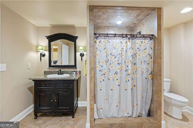 3130 Kates Way NW, Kennesaw, GA 30152 - bathroom featuring tiled shower, vanity, toilet, and baseboards