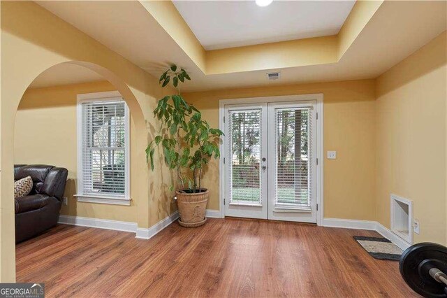 3130 Kates Way NW, Kennesaw, GA 30152 - foyer entrance featuring french doors, baseboards, wood finished floors, and healthy amount of natural light