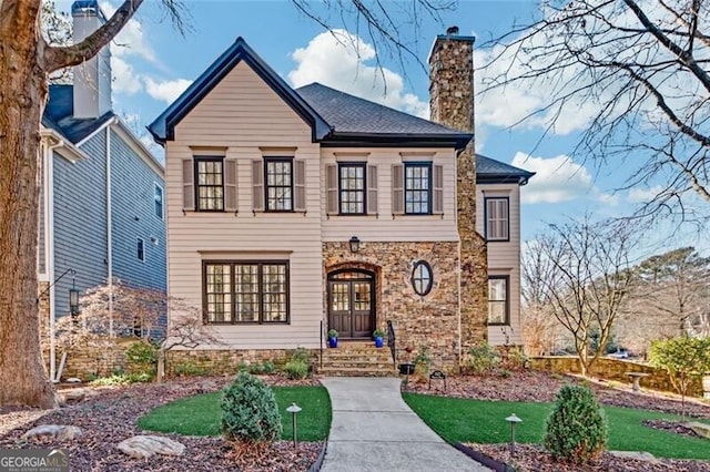 view of front of house with a front lawn