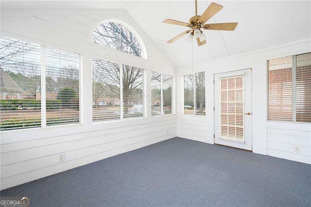 unfurnished sunroom featuring lofted ceiling and ceiling fan