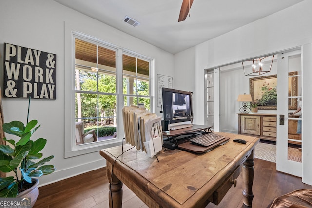 home office featuring ceiling fan and dark hardwood / wood-style flooring