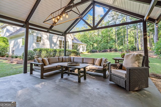 view of patio / terrace featuring a gazebo and an outdoor living space with a fire pit