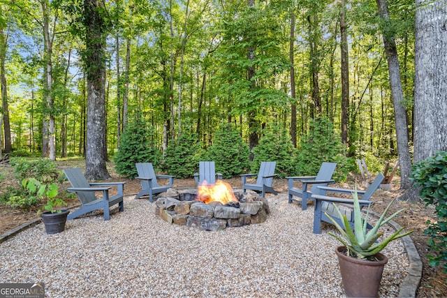 view of patio / terrace featuring a fire pit