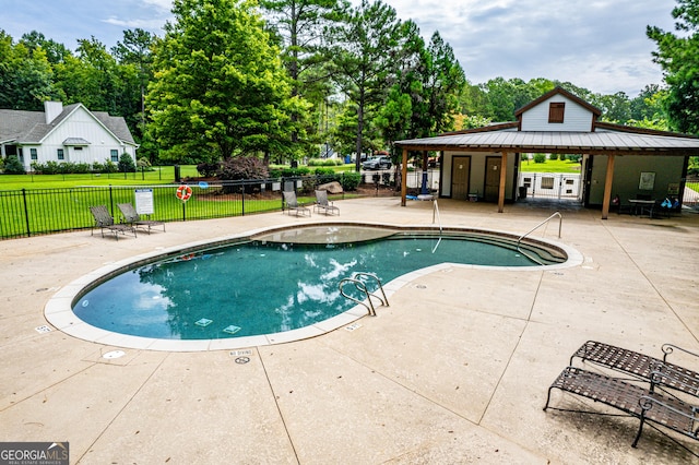 view of swimming pool with a gazebo and a patio