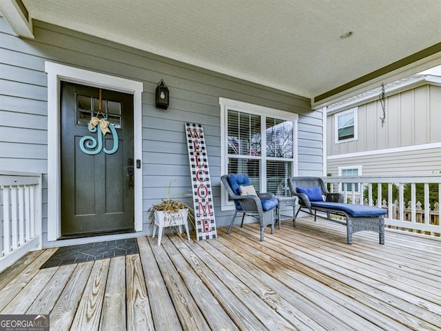 wooden deck featuring covered porch