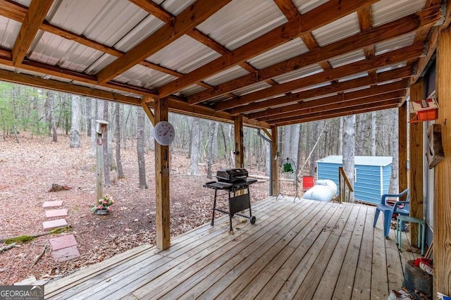 deck featuring a storage shed