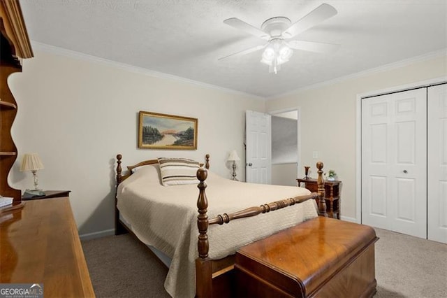 carpeted bedroom with crown molding, a closet, and ceiling fan