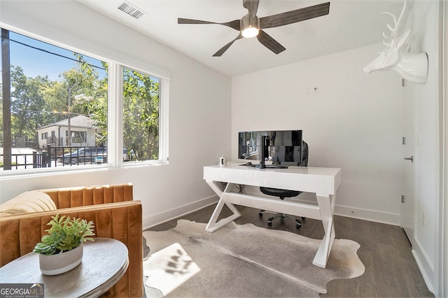 office area with ceiling fan and hardwood / wood-style floors