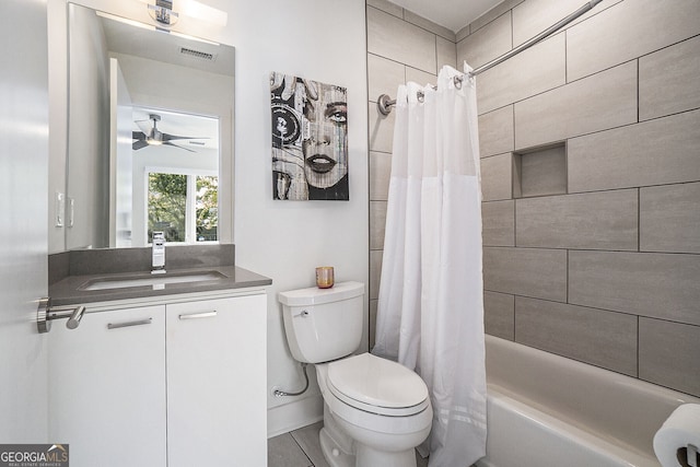 full bathroom with shower / bathtub combination with curtain, vanity, toilet, and ceiling fan