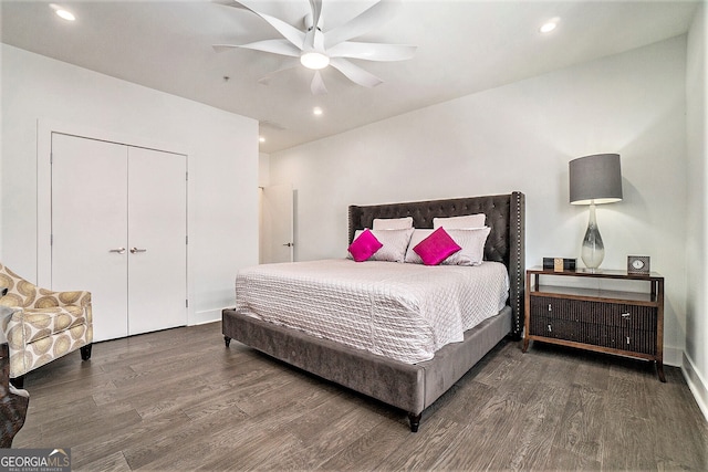 bedroom featuring ceiling fan and dark hardwood / wood-style floors