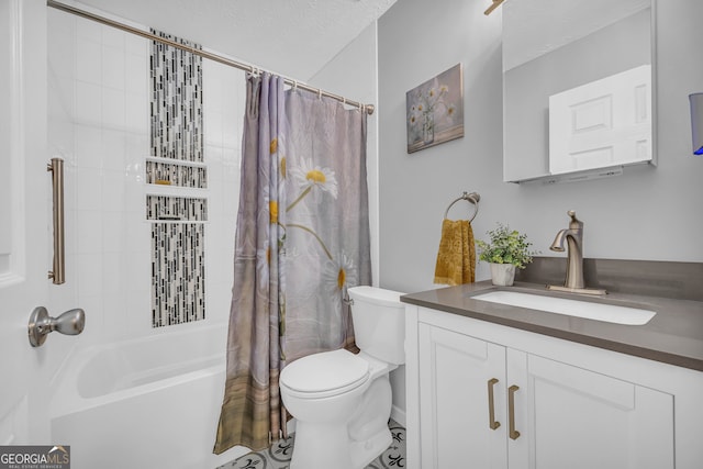 full bathroom with vanity, shower / tub combo, a textured ceiling, and toilet