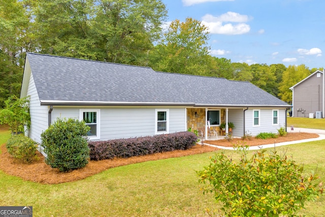 single story home with a porch and a front lawn