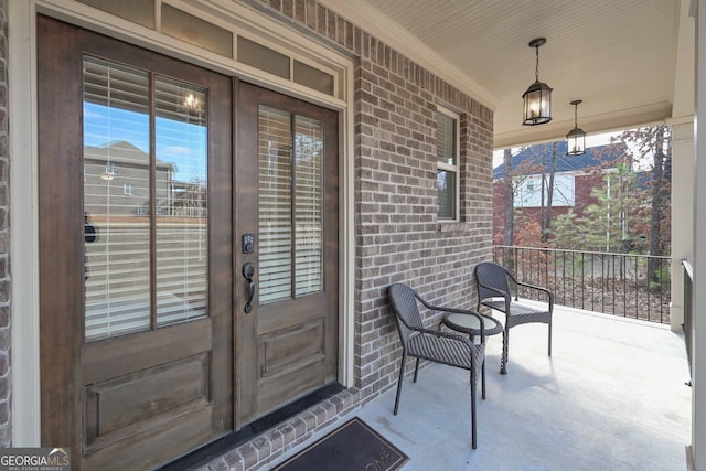 property entrance featuring covered porch