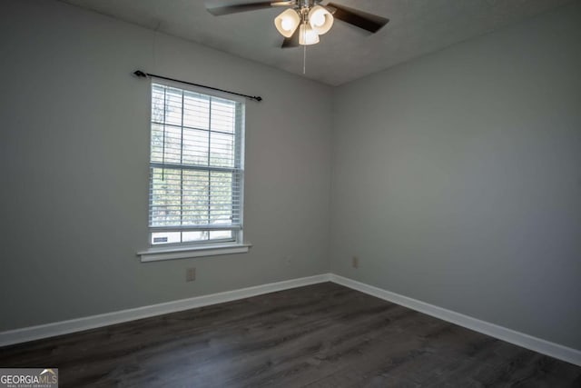 100 Downing Way Unit E, Athens, GA 30606 - empty room with dark wood-type flooring and ceiling fan