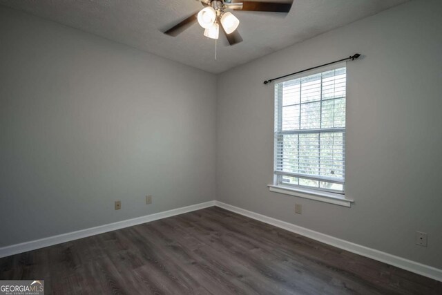 100 Downing Way Unit E, Athens, GA 30606 - empty room with ceiling fan and dark hardwood / wood-style floors