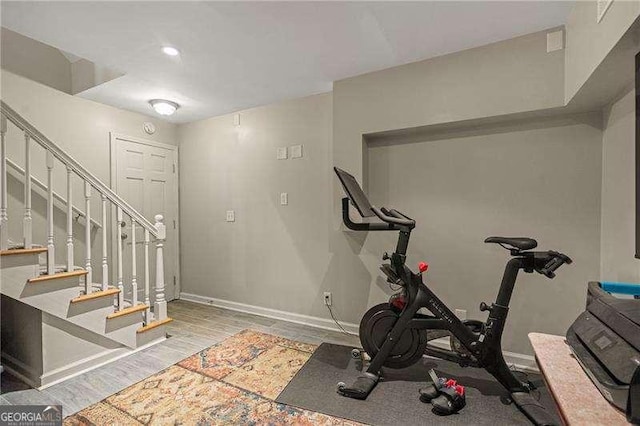 workout room with light wood-type flooring