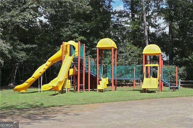 view of playground with a yard