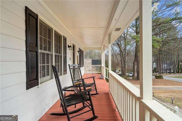 deck with covered porch