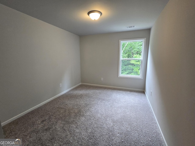 508 Clayborne Way Unit 246A, Loganville, GA 30052 - carpeted empty room featuring baseboards