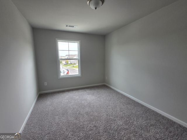 508 Clayborne Way Unit 246A, Loganville, GA 30052 - carpeted empty room with baseboards