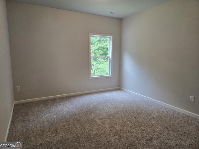508 Clayborne Way Unit 246A, Loganville, GA 30052 - carpeted spare room with baseboards