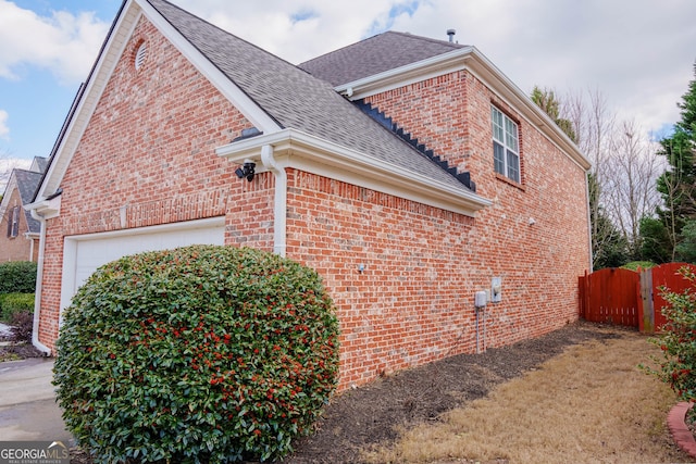 view of property exterior featuring a garage