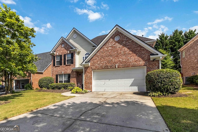 480 Glenns Farm Way, Grayson, GA 30017 - traditional-style home featuring brick siding, driveway, an attached garage, and a front yard