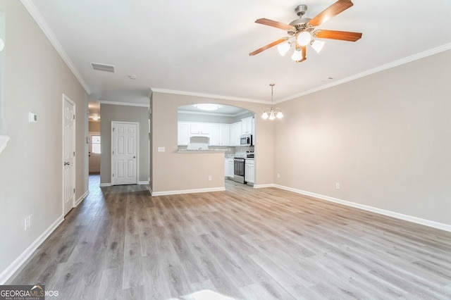 unfurnished living room featuring crown molding, ceiling fan with notable chandelier, and light wood-type flooring