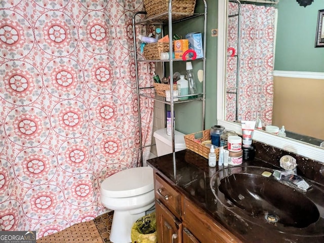 bathroom with vanity and toilet