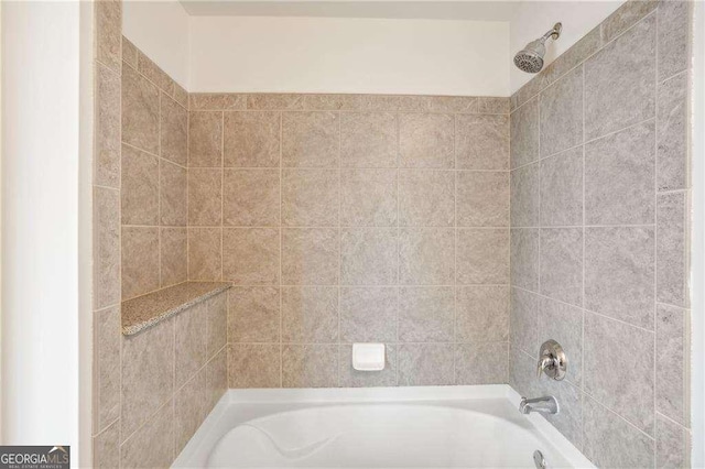 full bath with bathing tub / shower combination