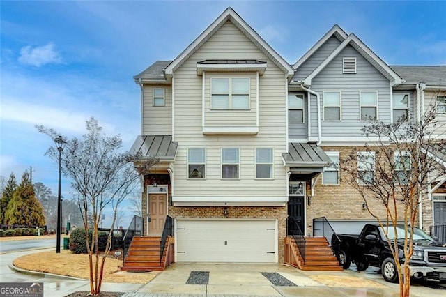 view of front of property featuring a garage