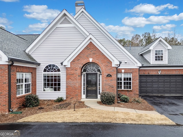 view of front of property with a garage