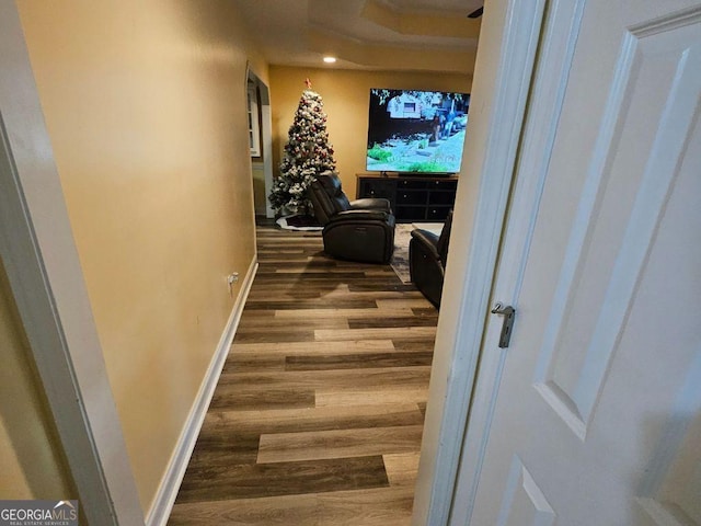 corridor featuring dark hardwood / wood-style floors