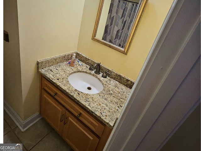 bathroom with vanity and tile patterned floors