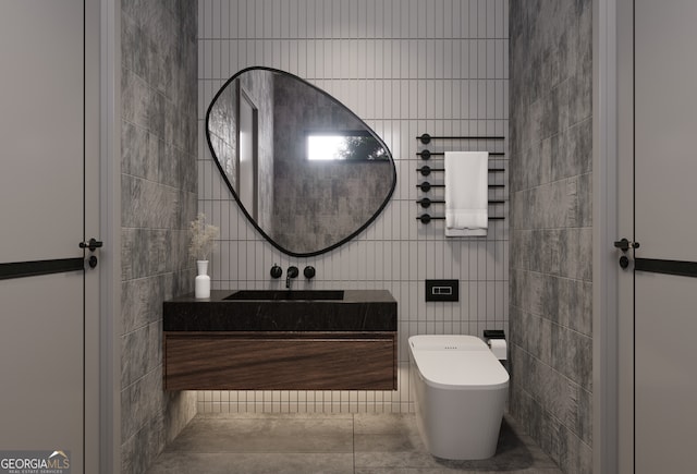 bathroom with vanity, tile walls, and toilet