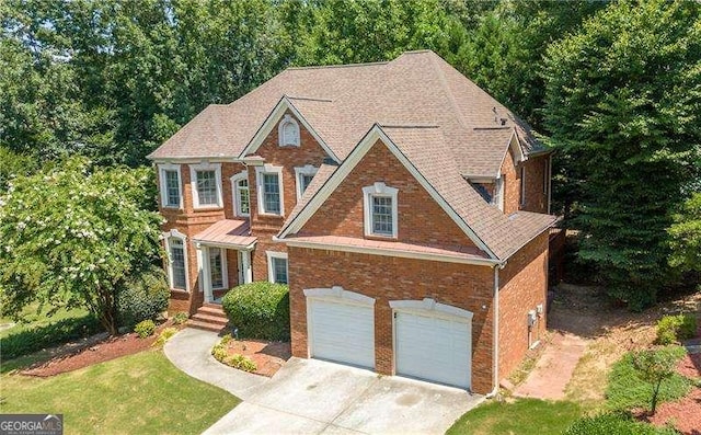 view of front of property featuring a garage